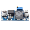 LM2596S DC-DC Buck Converter Power Supply module on a white background, emphasizing its compact design and electrical connections.