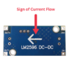 LM2596S DC-DC Buck Converter Power Supply module on a white background, emphasizing its compact design and electrical connections.