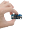 LM2596S DC-DC Buck Converter Power Supply module on a white background, emphasizing its compact design and electrical connections.
