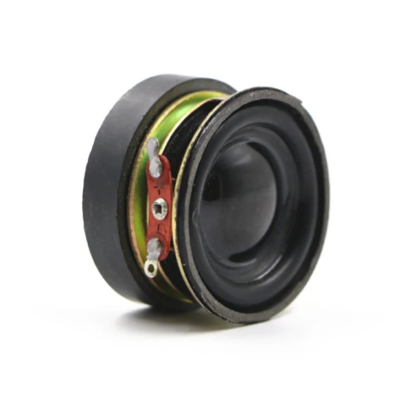 Close-up of a round, black 40mm speaker rated at 4 Ohms and 3 Watts, featuring an external magnet on the back.